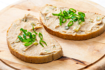 cracklings spread on bread with spring onion