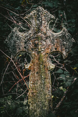 Dilapidated overgrown gravestone, Nunhead Cemetery, London, England, UK