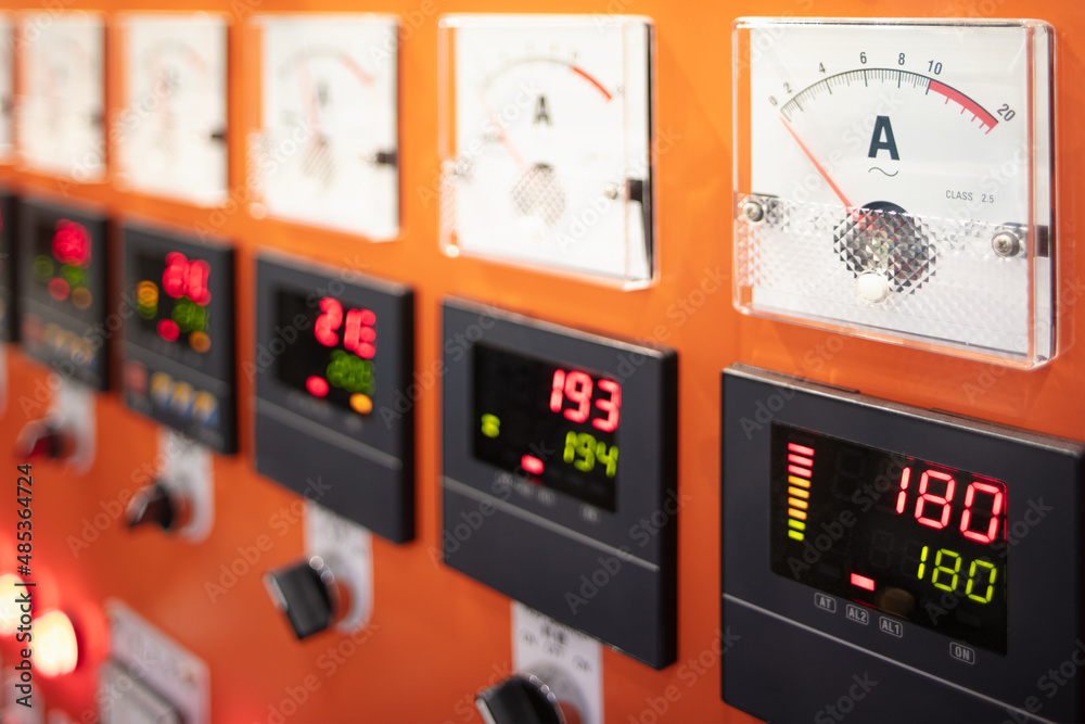 Wall mural Digital display and analog ammeter of switch gear in power plant.