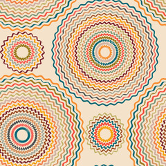 Ethnic ornament consisting of multi-colored zigzag circles on a beige background.