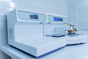 Paraffin wax dispenser tissue embedding machine at modern laboratory