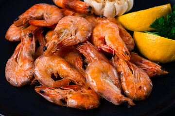 Fried shrimp, on a black background, top view, no people,