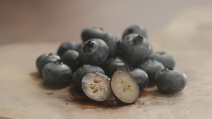 fresh blueberries on olive wood board