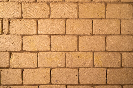 wall built of stone blocks of tuff