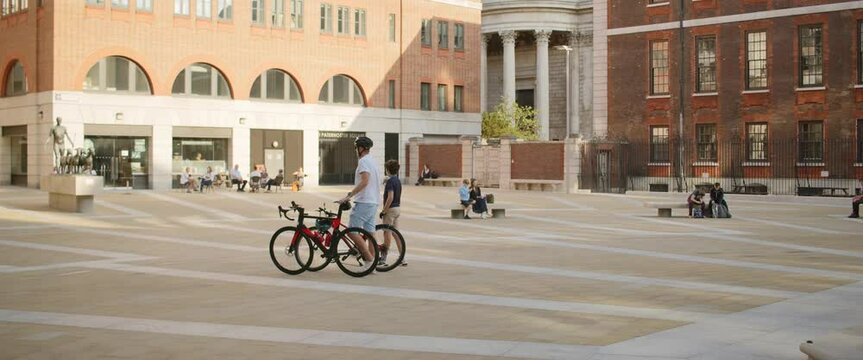 Walking Dad With Kid Bicycle St. Paul's Paternoster Square Slow Motion London