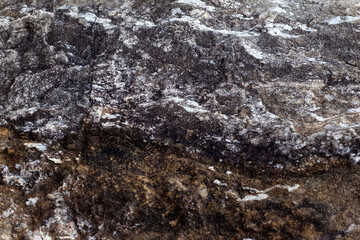 Gray-beige stone texture. Rock. Stone background. Relief surface. Beautiful natural pattern on the plane. Raster image