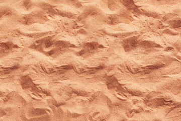 Natural close up beach sand background. Light beige, white sandy beach texture. Summer vacation, travel at sea relaxation concept. Copy space, place for text