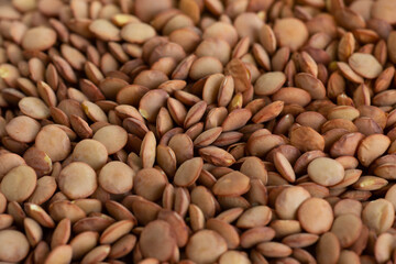 Traditional Turkish domestic lentil background, flat lay. Texture of lentils.Dry organic brown lentils
