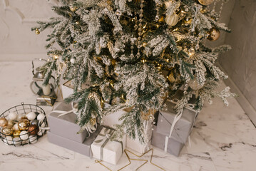 Christmas decor, beautifully packaged gifts under the Christmas tree