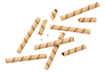 Wafer rolls striped whole and pieces falling on a white background, cut. Isolated