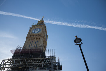 Historic and Iconic restored Big Ben after conservation works in 2022 with blue and gold color scheme - obrazy, fototapety, plakaty