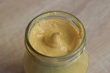 glass jar of dijon mustard