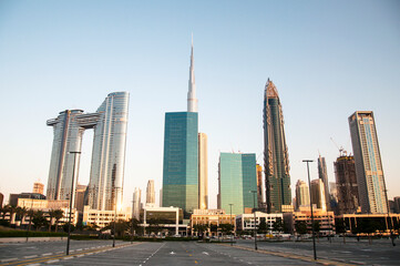 Fototapeta na wymiar Sunset on Dubai's City Skyscrapers with Burj Kalifa in background, located in the luxurious City Walk area.