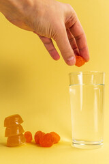 Dissolvable drinks dissolvable cubes, food ingredients frozen to add superfoods or functional additives. Vertical photo