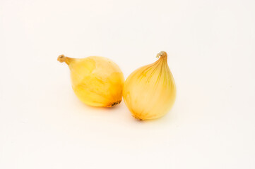 Brown onions isolated on white.