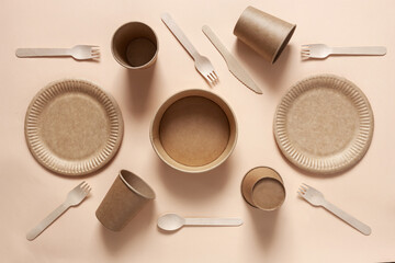Various Eco-friendly disposable tableware for food over pastel background. Top view