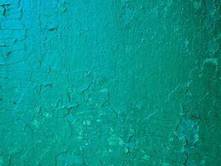 Damaged weathered green background, old with paint worn metal wall surface texture.