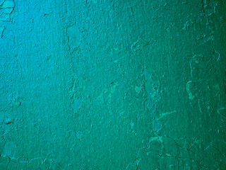 Damaged weathered green background, old with paint worn metal wall surface texture.