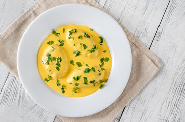 Quenelle with Hollandaise sauce