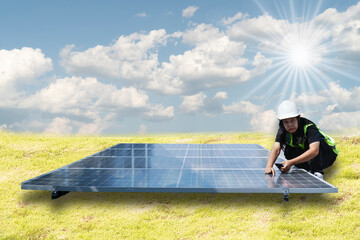 Female engineer on inspection of solar panels outdoors.
