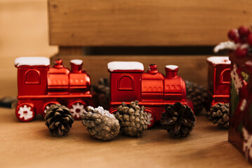 Christmas interior decor with Table, Red toy train