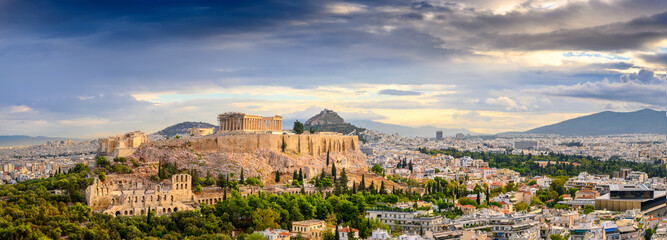 Obraz premium Picturesque Panorama of Athens with Acropolis hill at sunset, Athens, Greece. The Old Acropolis is the main attraction of Athens.