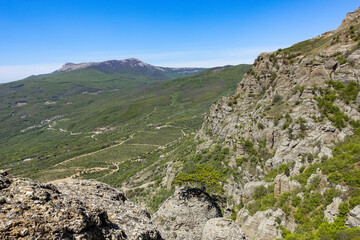 View of the Chatyr-Dag plateau from the top of the Demerdzhi mountain range in Crimea. Russia.