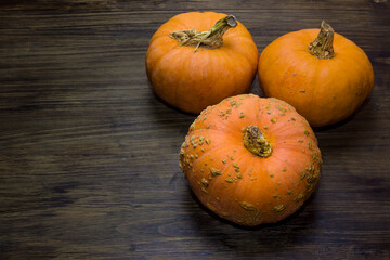 Pumpkins. Ripe pumpkins on a wooden table.