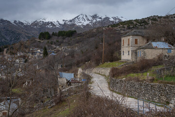 Old stone houses on the mountain at the traditional village of Kalarites in Tzoumerka, Greece