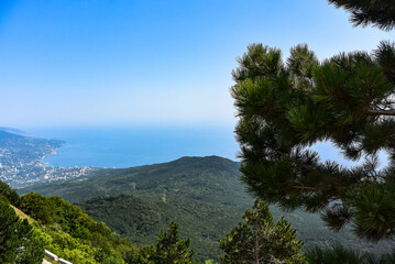Fototapeta na wymiar Picturesque view of the city of Yalta and the Black Sea from Ai Petri mountain in the Crimea. Russia.