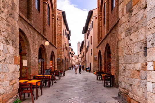 Fototapeta Narrow street in the historic town of San Gimignano Italy