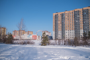 Fototapeta na wymiar View of the buildings in the new quarter in winter, Voronezh, Russia.