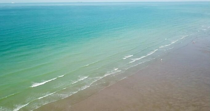 aerial photography of a beautiful beach with few people and turquoise water of the sea, Opal Coast, France