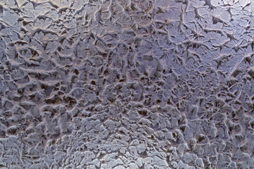 Wall with decorative plaster with sharp edges.