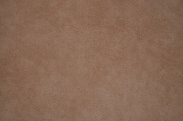 Artificial beige leather texture background