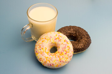 Donuts and milk on a blue background