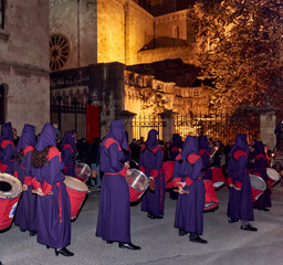 Procession of Nazarenes with drums of Holy Week in Spain.