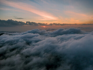 Aerial view of the sunset over the Mount Pantokrator from drone . Sky with clouds. Sky background