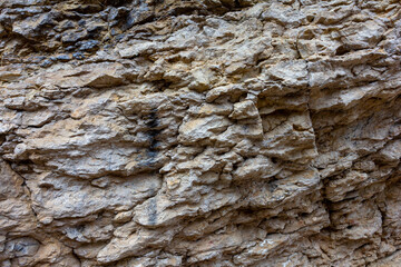 Natural natural stone, stone tunnel of a mountain river ,inert material used for construction work and decorative decoration, close-up. -