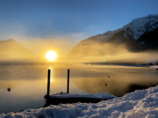 Sunrise over lake Achensee in Pertisau Austria in wintertime