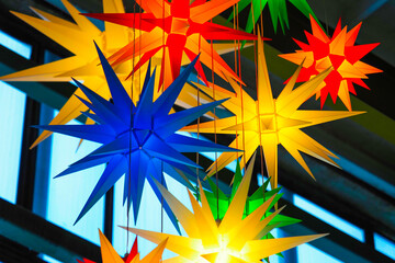 Lanterns in the form of multicolored stars, festive decorations