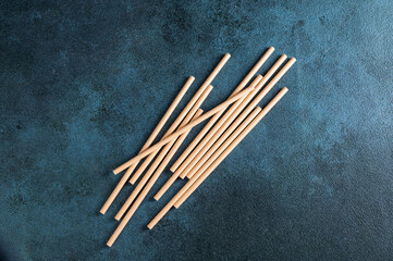 Eco friendly Reusable Straw. Paper cocktail tubes. Kraft paper straw for drinking coffee or tea. Disposable cocktail tube. Zero waste concept.