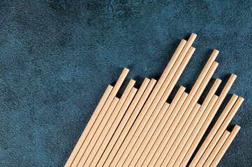 Eco friendly Reusable Straw. Paper cocktail tubes. Kraft paper straw for drinking coffee or tea. Disposable cocktail tube. Zero waste concept.