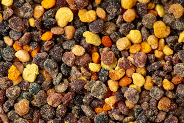 Pile of bee pollen on white