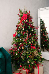 Christmas tree with beautiful toys, stylish Christmas and New Year decor