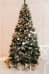 Christmas tree with beautiful toys, stylish Christmas and New Year decor