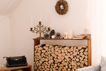 Christmas interior decor with logs and vintage items