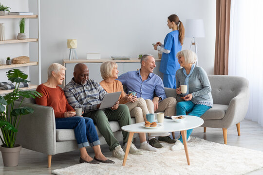 Friendly multiracial group of elderly people spending time together