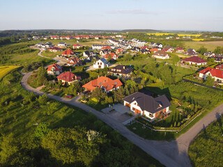 Modern residential district, suburbs or village in Poland, aerial view.