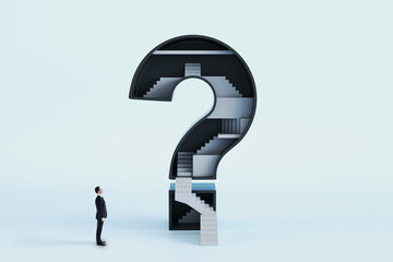 Businessman looking at abstract question mark with stairs inside on white background. Challenge and career growth concept.